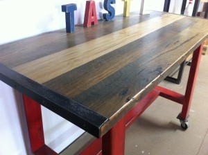 Red Metal Island Bench with Blackbutt Top - Close Up